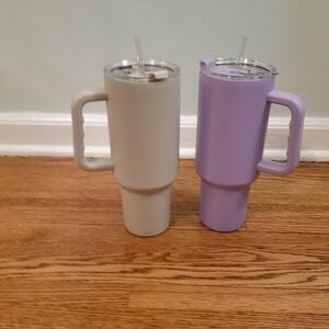Brand new 40oz Purple and Stone Insulated Tumblers w handle. No tags.
